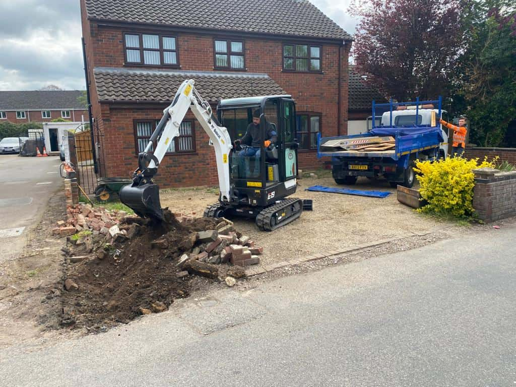 This is a photo of an operative of Shortstown Driveways Digging out for a new tarmac driveway