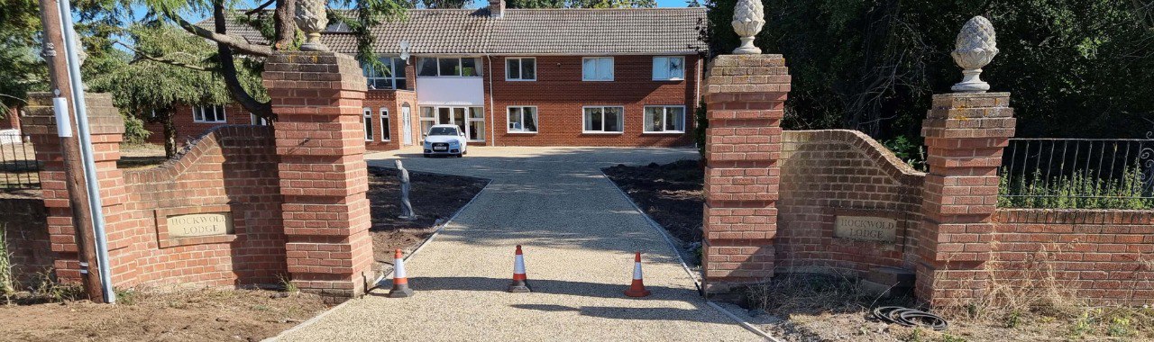 This is a photo of a newly installed chip and tar driveway, installed by Shortstown Driveways